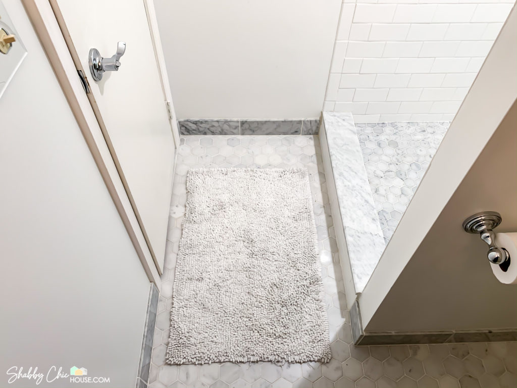 White Subway Tile Shower with 2" Italian Carrara Shower Floor, Italian Carrara Shower Curb and 3" Italian Carrara Bathroom floor