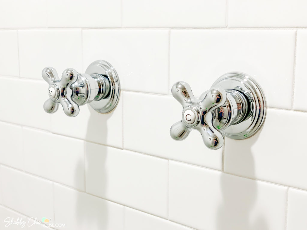 White Subway Tile and Old Fashioned Chrome Shower Handled