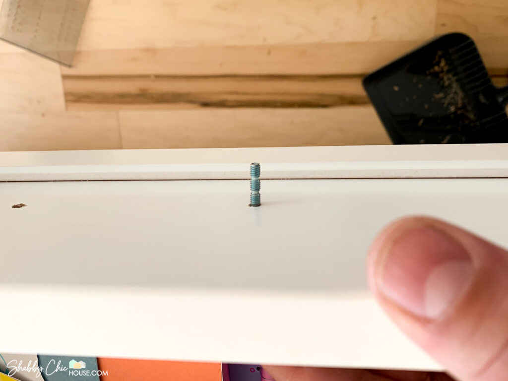 Cabinet hardware screw photo showing gap in threads for cutting to size