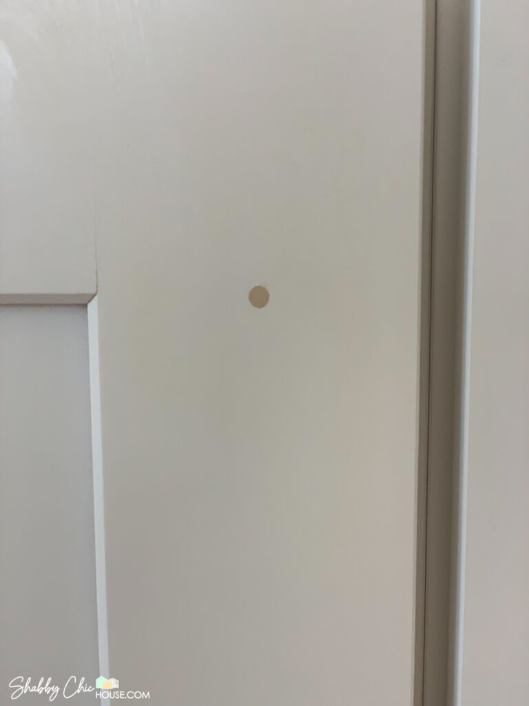 How to fix hole in cabinet - errant hole drilled repaired with wood filler