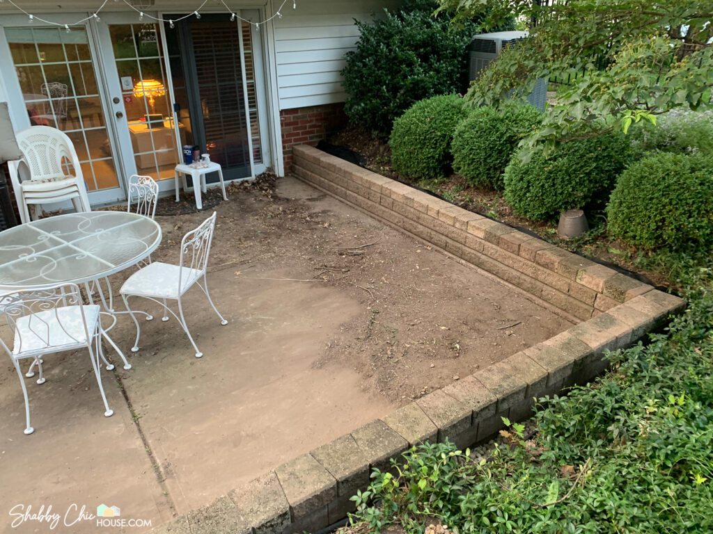 photo of a patio right after the retaining wall has been rebuilt for a blog post on selling your house quickly.