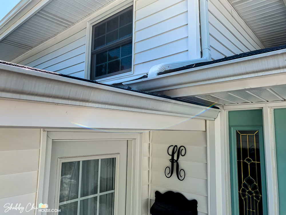 Gutters with gray run-off stains prior to getting a Spring Cleaning with Miracle Mist
