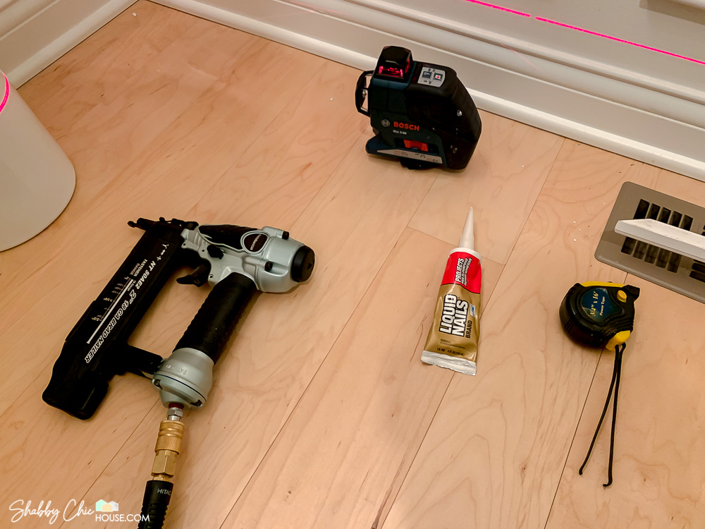 Tool used for wainscoting. Metabo 18 gauge brad nailer, Bosch three plane laser level, measuring tape and liquid nails.