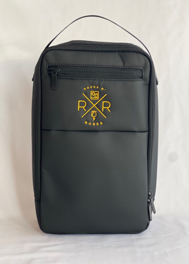 Black and Gold waterproof golf shoe bag with valuables pocket.